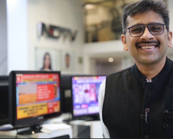 Sanket Upadhyay paosing at his newsroom on NDTV
