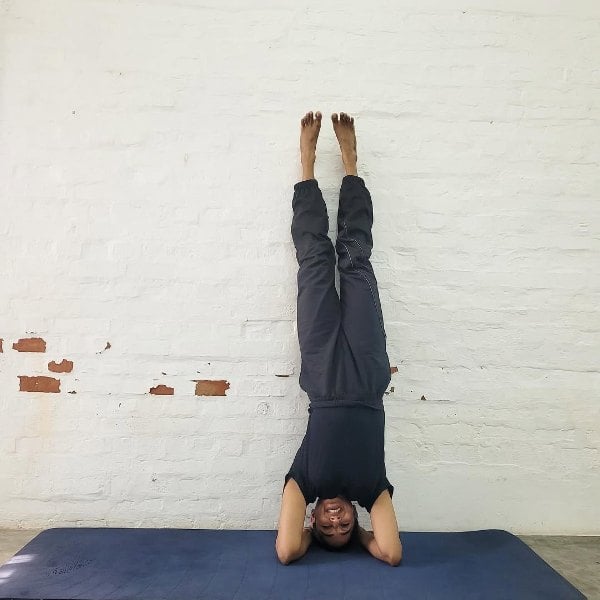 Santhy Balachandran practicing yoga