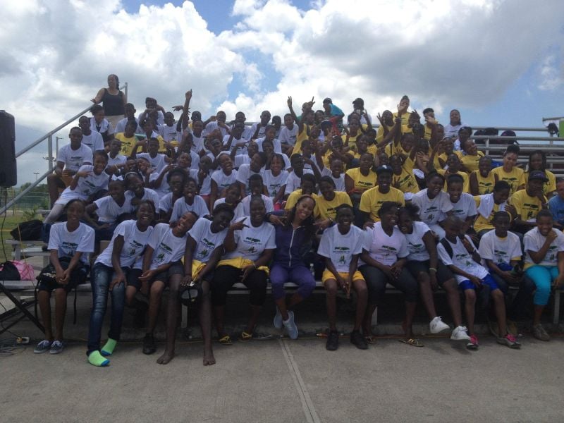 Sanya Richards-Ross with mentors and the beneficiary children of the Fast Track Program