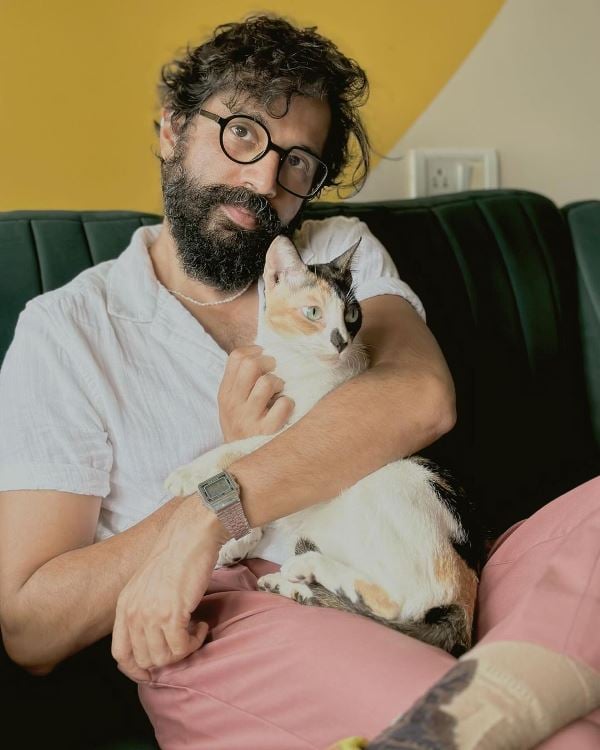 Sarang Sathaye with his cat