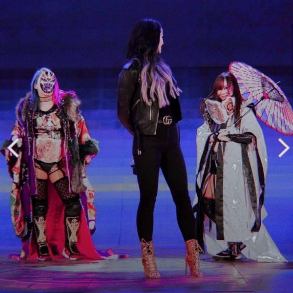 Saraya Bevis (in black) aka Paige with Asuka and Kairi Sane