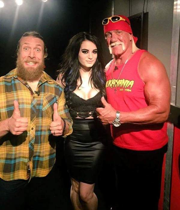 Saraya Bevis with Daniel Bryan (left) and Hulk Hogan (right) during Tough Enough show