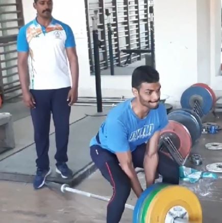 Sarvesh Kushare working out at the gym