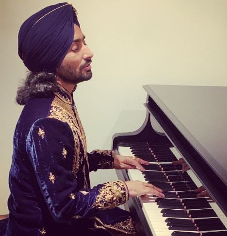 Satinder Sartaaj playing the piano