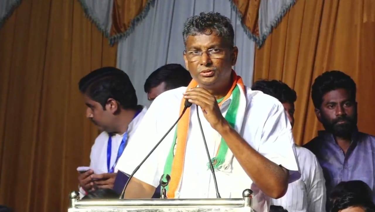 Satish Jarkiholi speaking at a public function