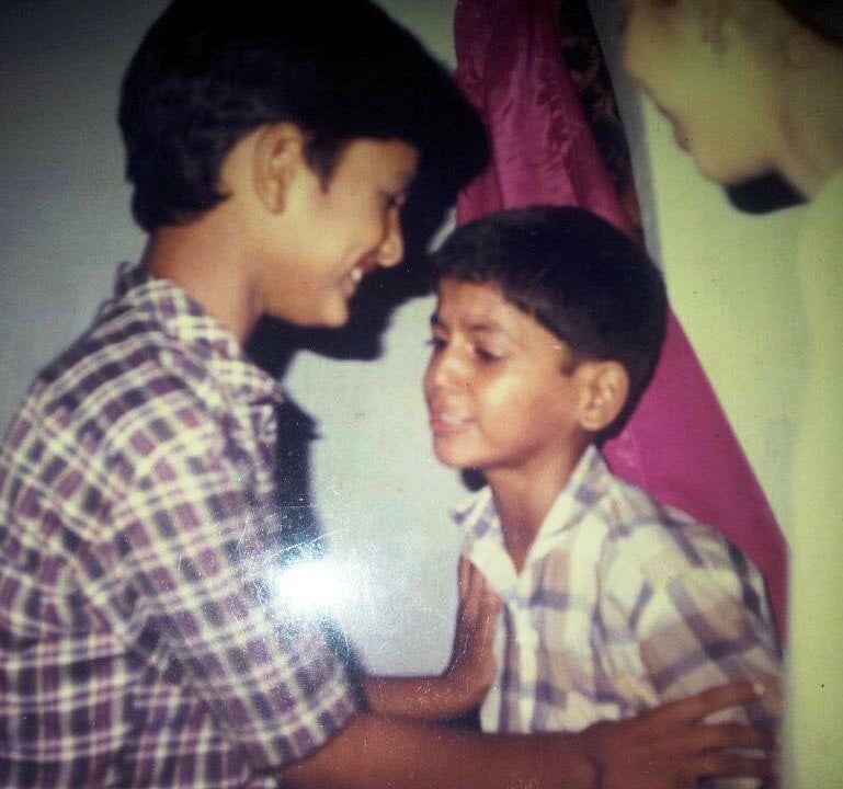 Saurabh Dwivedi crying while one of his cousins tries to bring him in front of the camera