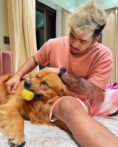 Scout with his pet dog Luffy