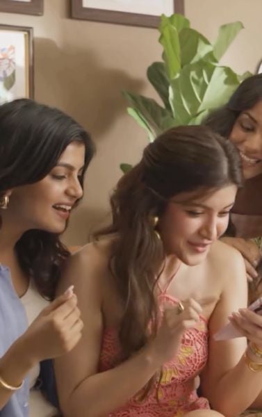 Sehaj Rajput (extreme left) in a still from the Samsung India TV commercial (2024)