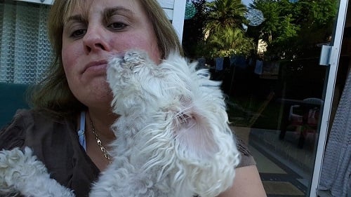 Selva Pérez with her pet dog