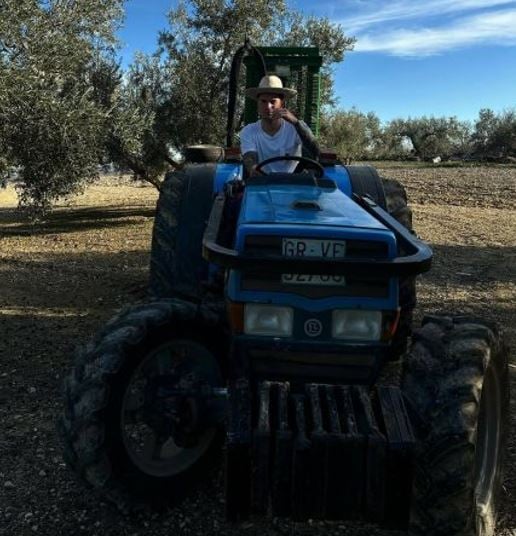 Sergio Aguilera driving a tractor