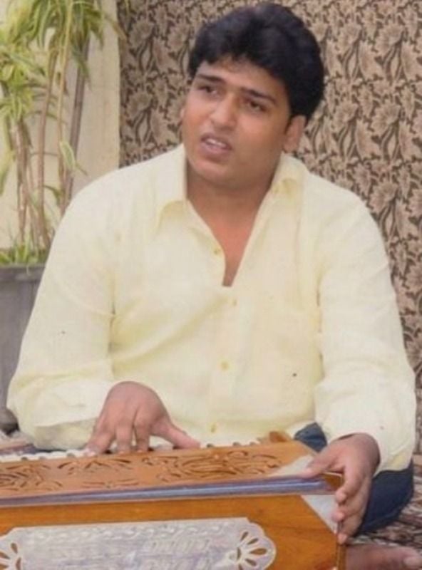 Shabab Sabri playing the harmonium