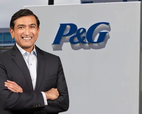Shailesh Jejurikar with the logo of P&G