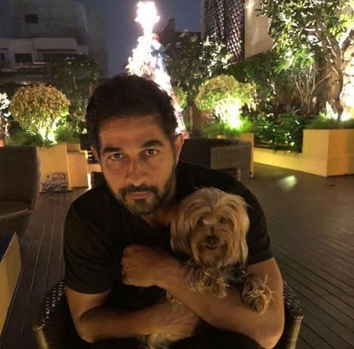 Shakeel Ladak and his pet dog