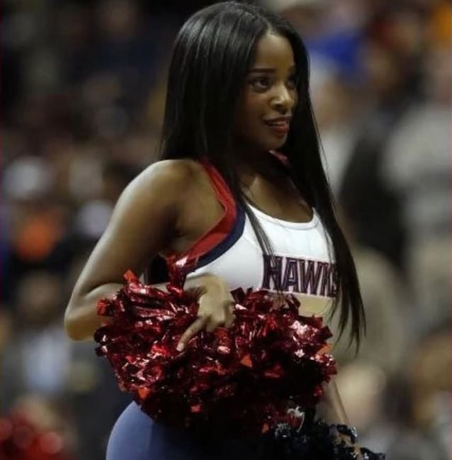 Shamea Morton Mwangi cheering for the Atlanta Hawks