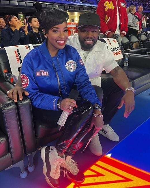 Shamea Mwangi Morton with rapper 50 Cent while hosting an NBA All-Star Game