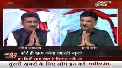 Shammi Narang on a news channel as a guest speaker