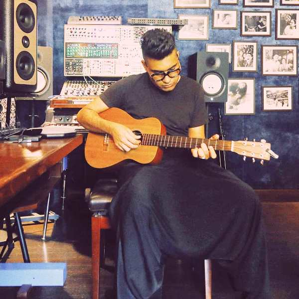 Shashwat Sachdev playing the guitar