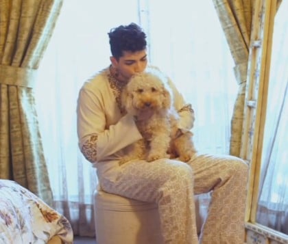 Sheharyar Shahid posing with his pet