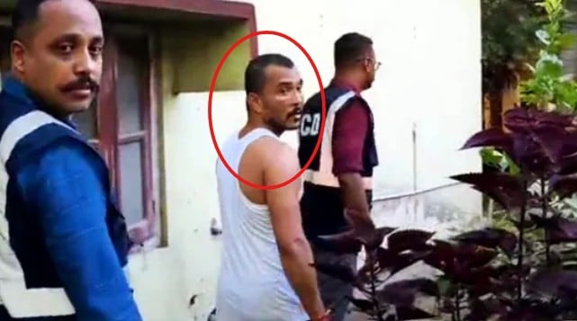 Shekhar Jyoti Goswami, after being detained by the Special Investigation Team (SIT) at his Garigaon residence