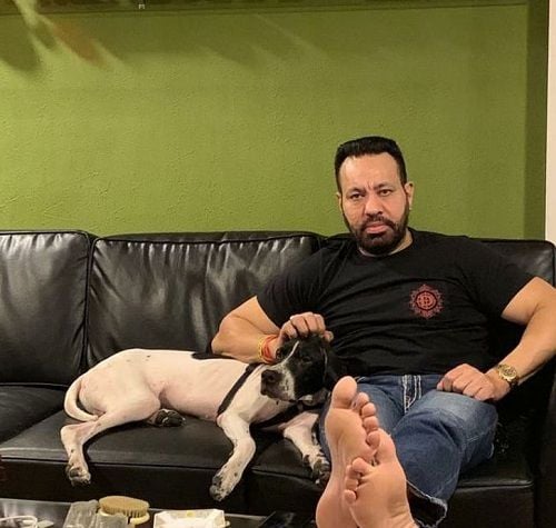 Shera with his pet dog