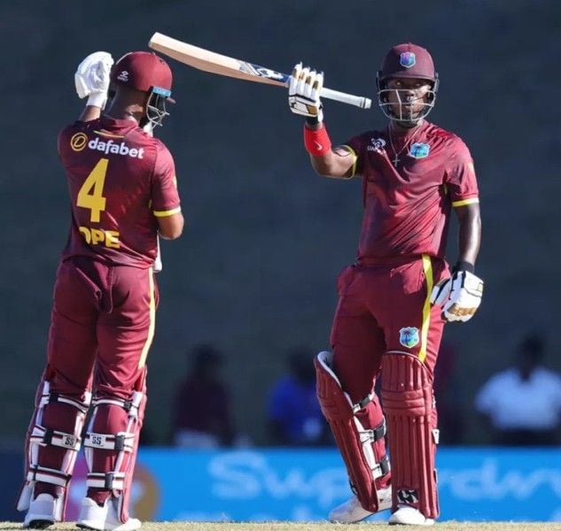 Sherfane Rutherford waving his bat after scoring his maiden ODI fifty