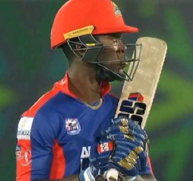 Sherfane Rutherford wearing Mumbai Indians (MI) gloves for Karachi Kings