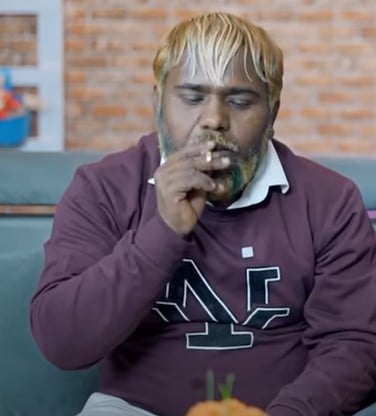 Sherpal Bairagi smoking a bidi