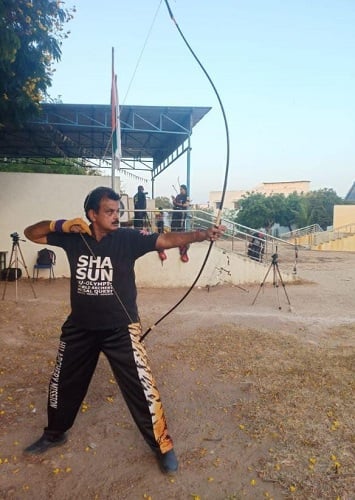 Shihan Hussaini doing archery
