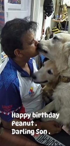 Shihan Hussaini with his pet dog