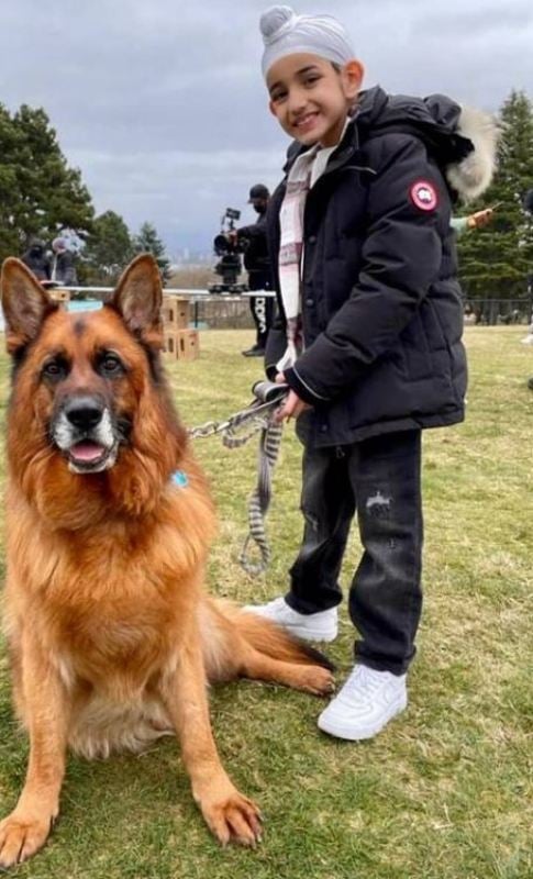 Shinda Grewal with his pet dog