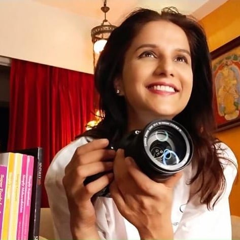 Shipra Khanna with a DSLR