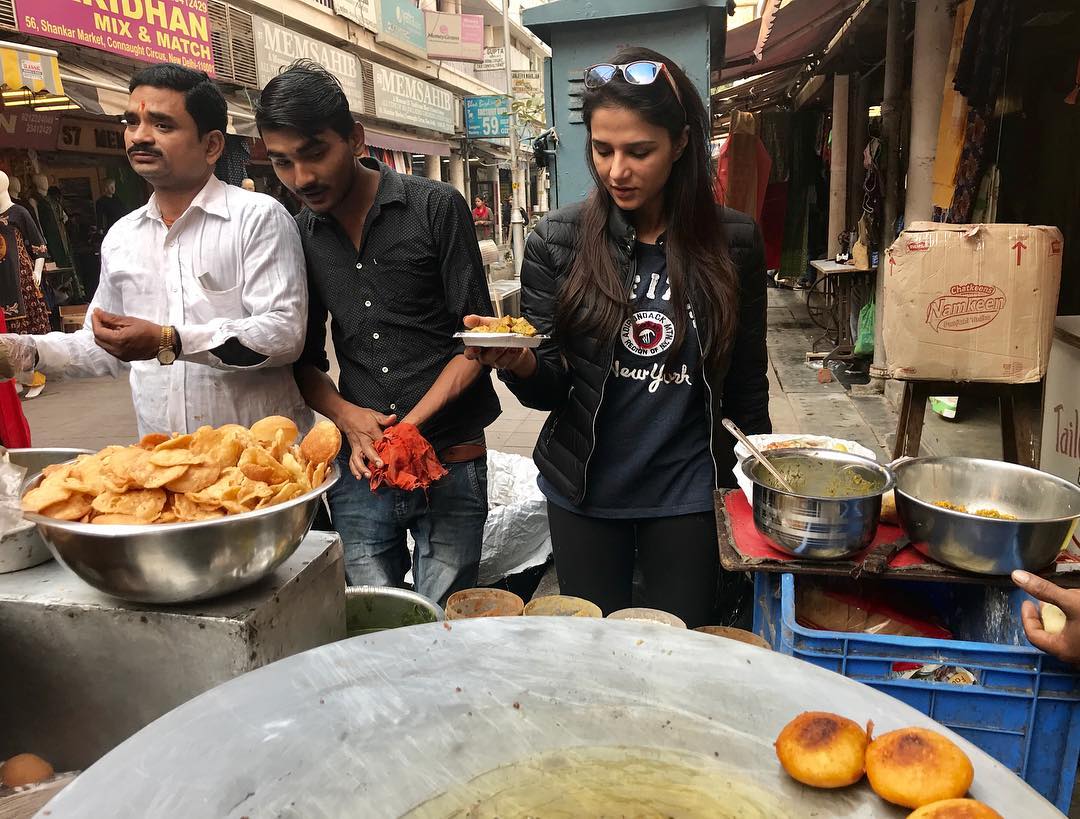 Shipra while eating Indian street food