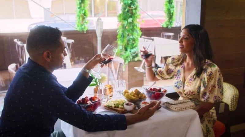 Shital Patel drinking wine during a date with Niraj Mehta