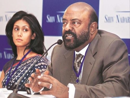 Shiv Nadar with her daughter Roshni Nadar Malhotra during a conference