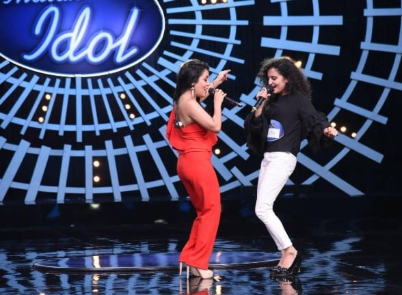 Shiva Choudhary singing on the sets of Indian Idol with Neha Kakkar