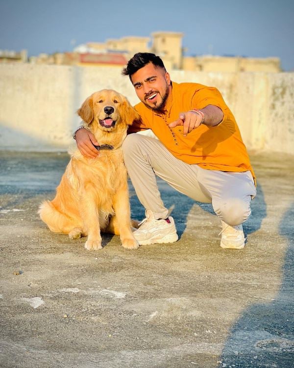 Shivam Dikro with his pet dog