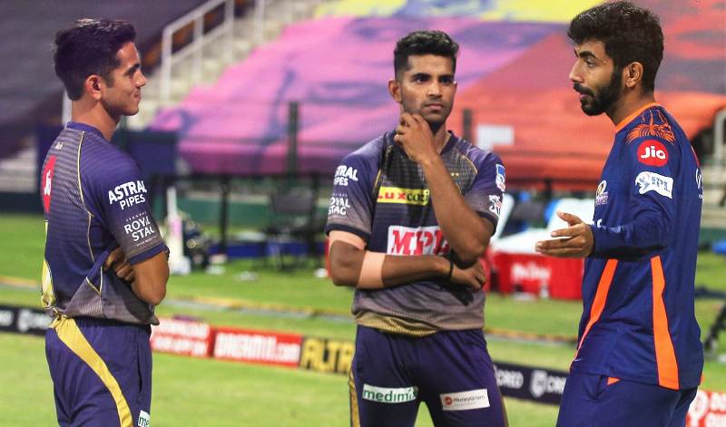 Shivam Mavi (centre) with Jasprit Bumrah (right)