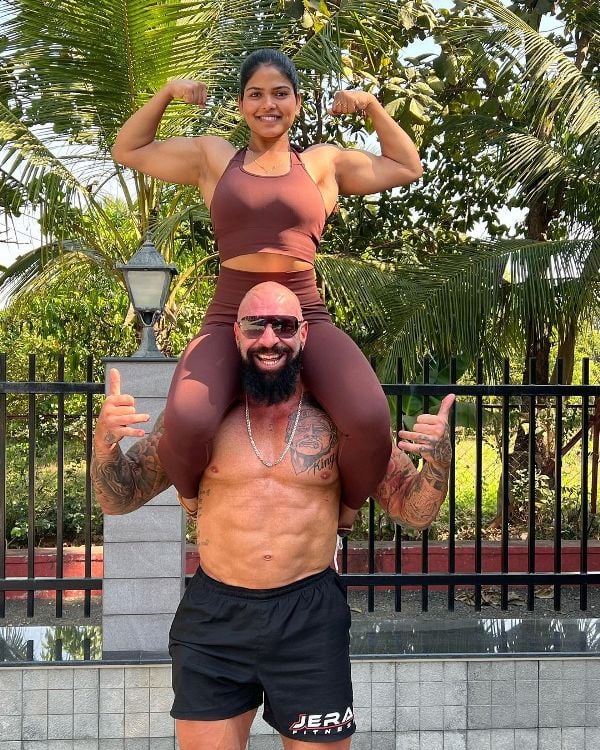 Shivani Gupta with John Lucas