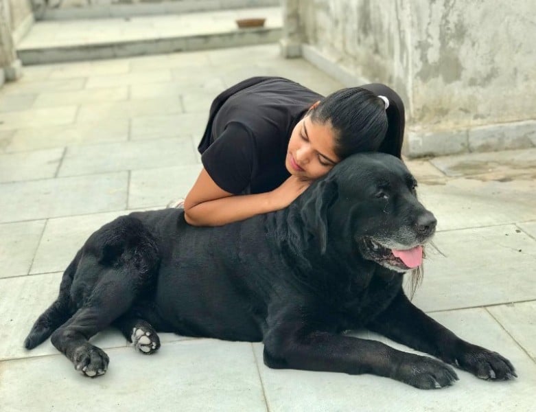 Shivani Gupta with a dog