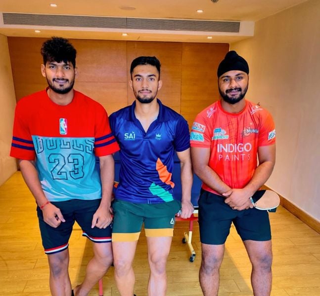 Shivansh Thakur (centre) with his team members of PKL season 9