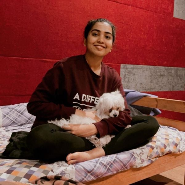 Shivathmika Rajashekar holding her pet Ola