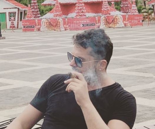 Shpat Kasapi, while enjoying smoking