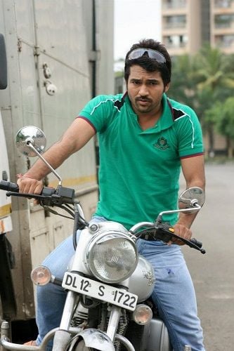 Shreedhar Dubey sitting on his motorcycle