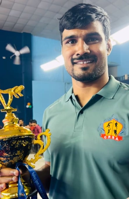 Shrikant Jadhav posing with the bronze medal he won in the National Railways championships organised at Gorakhpur