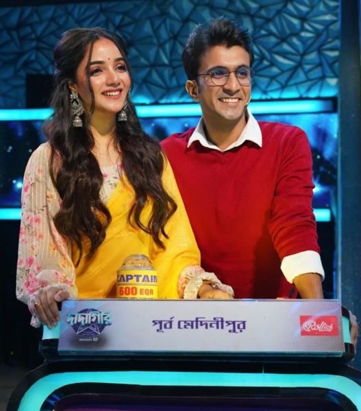 Shritama Mitra (left) in a still from season 10 of the Bengali quiz show titled 