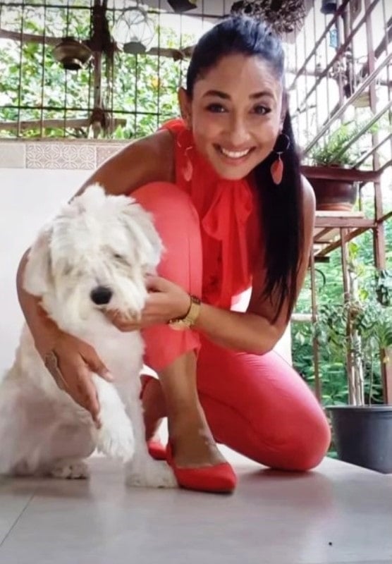 Shruti with her pet dog