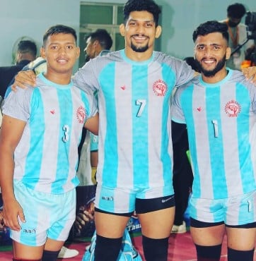 Shubham Shinde (right) while posing for the Maharashtra team