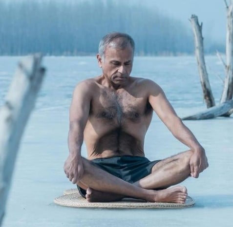 Siddharth Chatterjee while practising pranayam and yoga in his documentary film