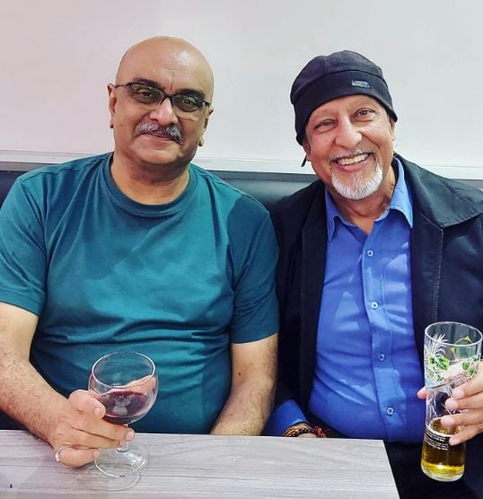 Siddharth Randeria enjoying a drink with his friend