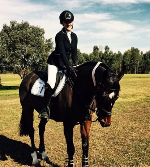 Sienna Weir riding a horse during her childhood
